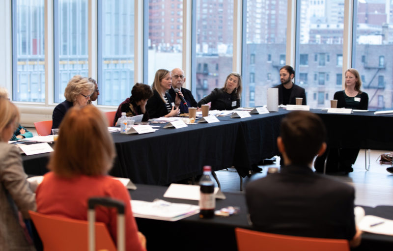 Meeting with between stakeholders with windows in the back